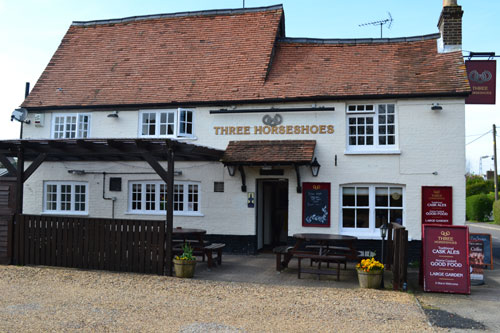 three horseshoes